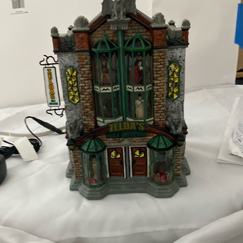 Department 56 Snow Village Halloween ornaments.